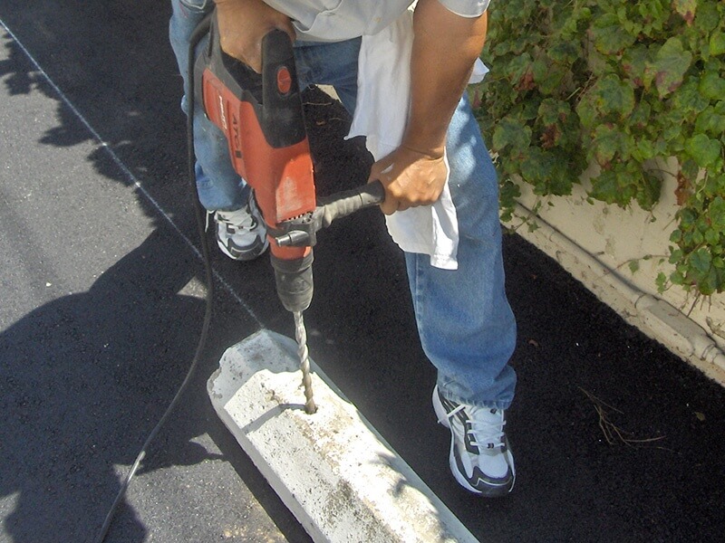 Rubber & Concrete Wheel Stop & Parking Block Installation California