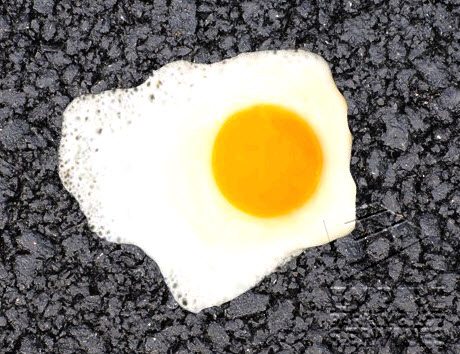 Egg on sidewalk