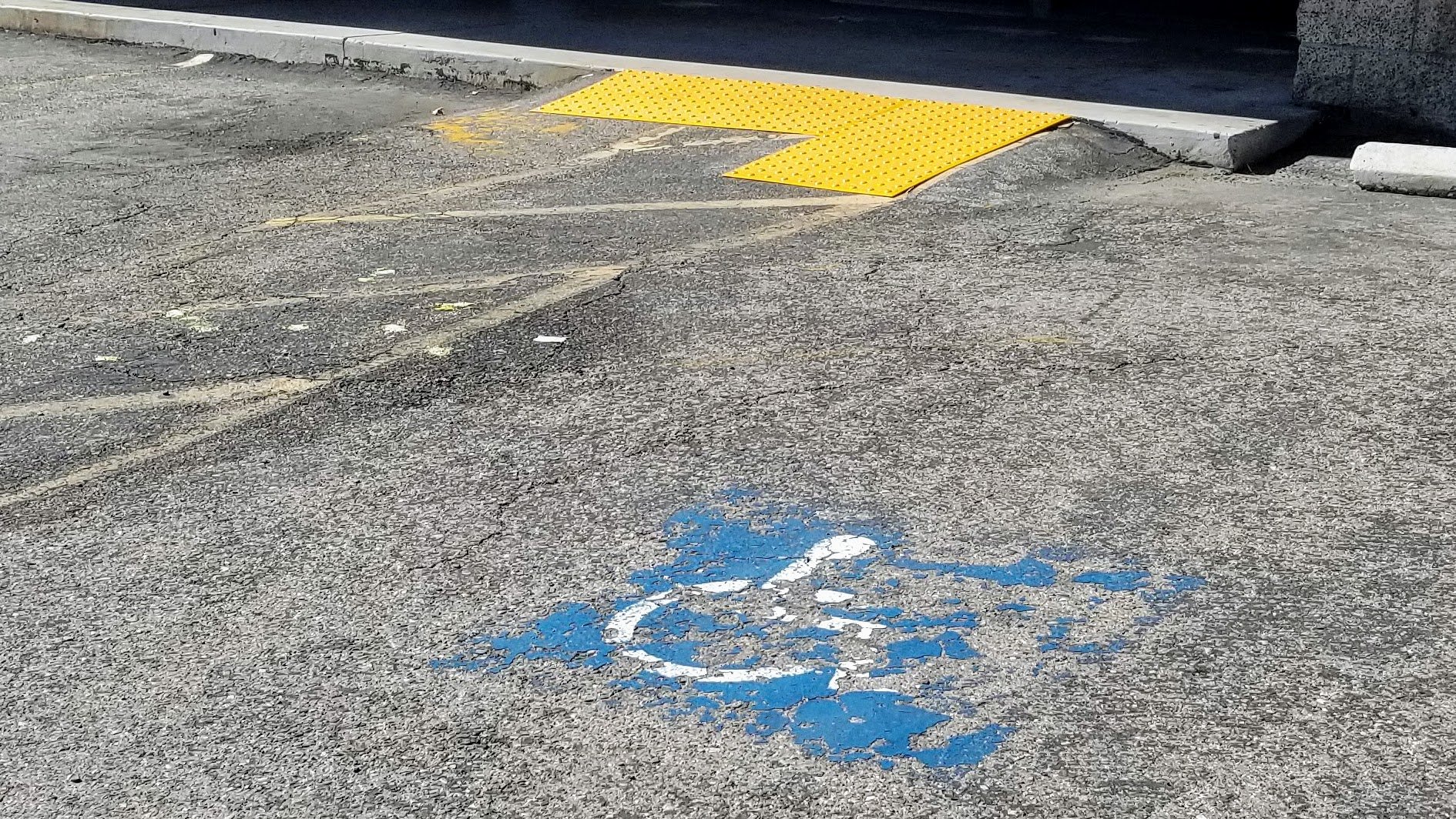 bad ramp for ADA handicap stall