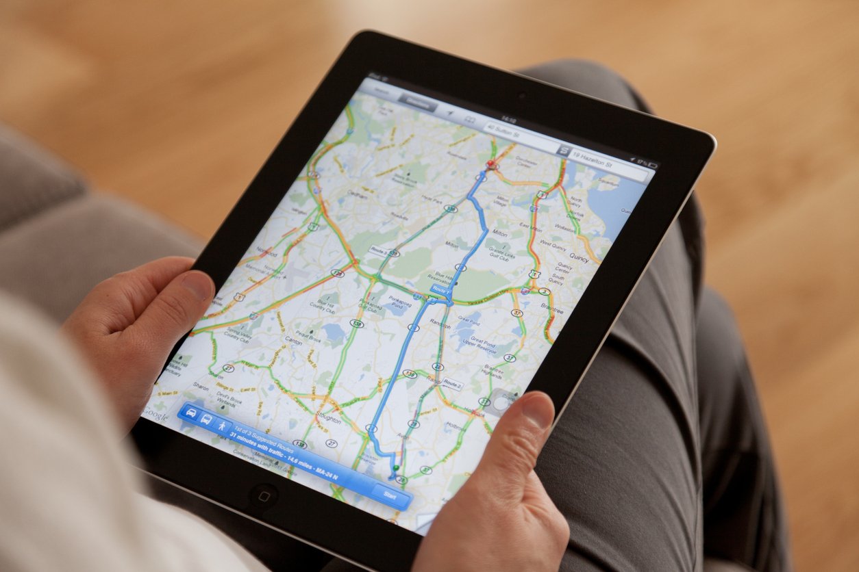 searching for asphalt company on google maps using tablet
